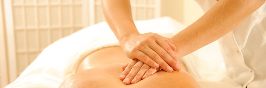 Beautiful woman in a spa with massage therapy